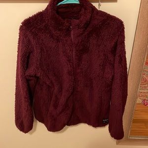 Purple polo assassin size large fleece